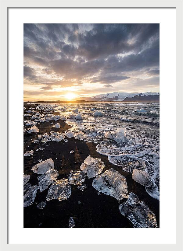 Icebergs At Sunset On Black Sand