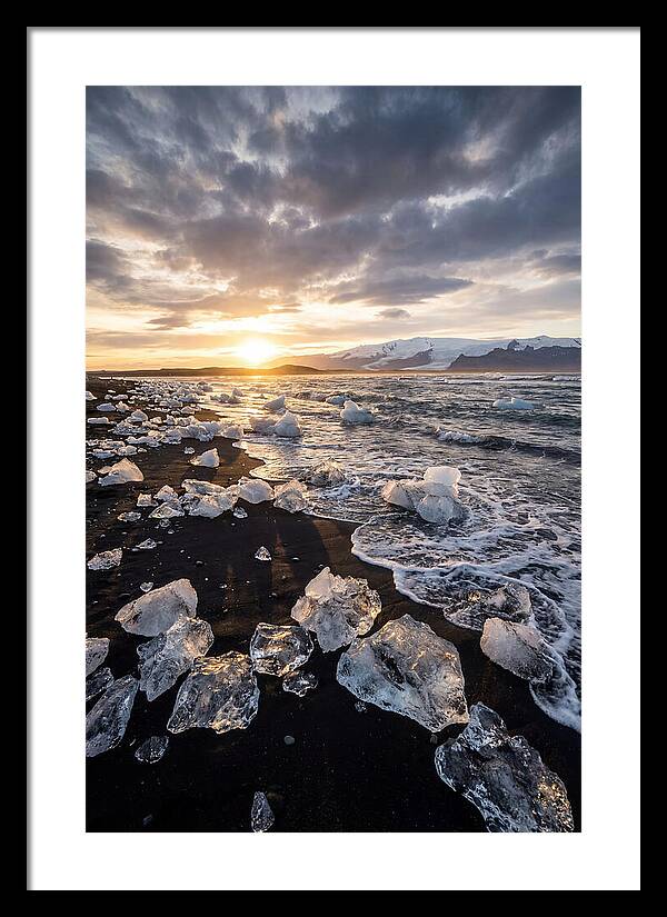 Icebergs At Sunset On Black Sand
