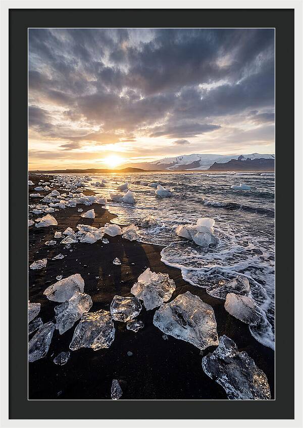 Icebergs At Sunset On Black Sand