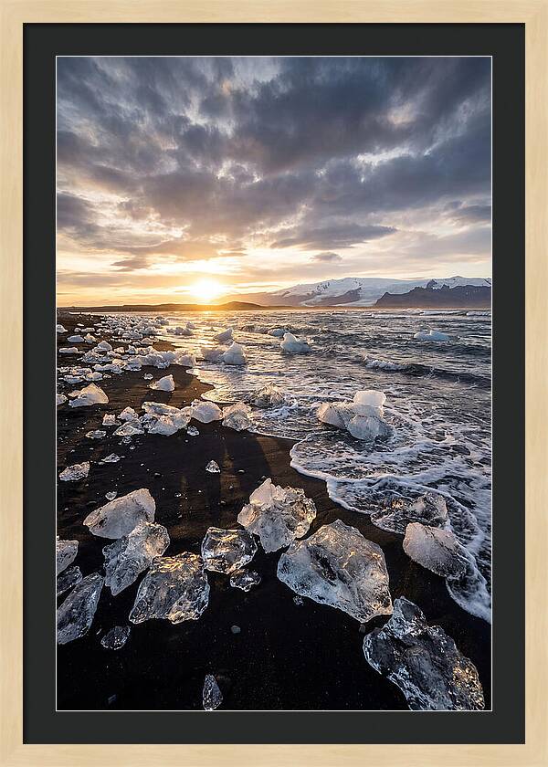 Icebergs At Sunset On Black Sand