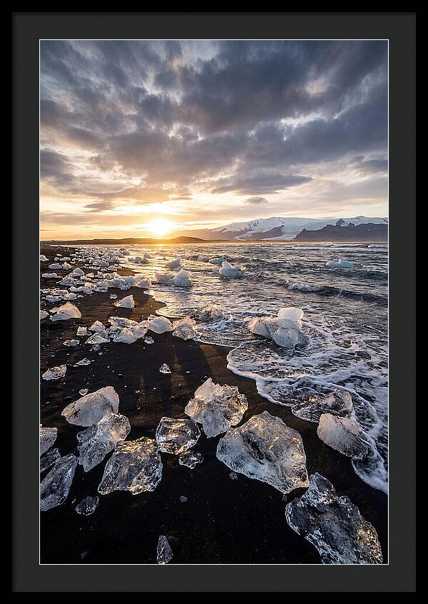 Icebergs At Sunset On Black Sand