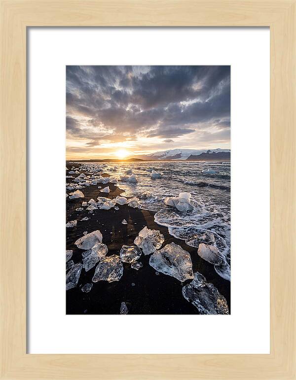 Icebergs At Sunset On Black Sand