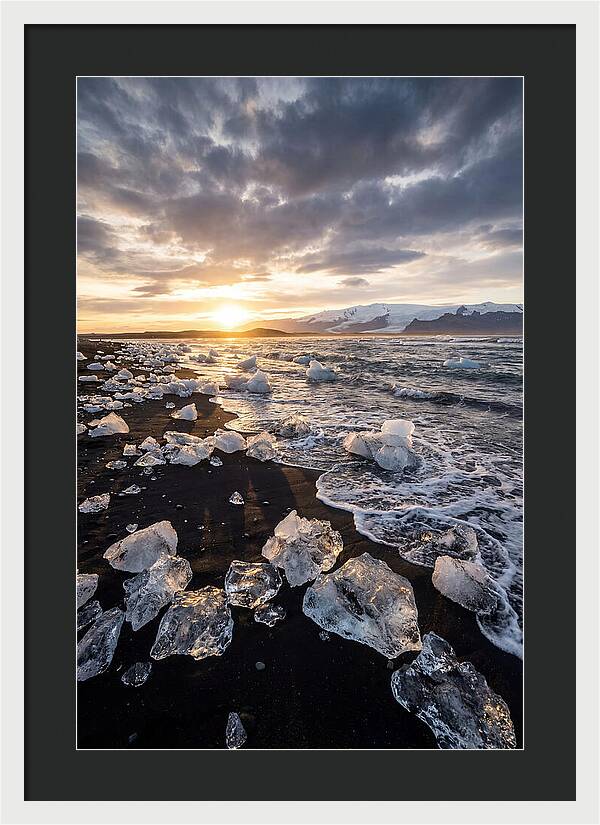 Icebergs At Sunset On Black Sand