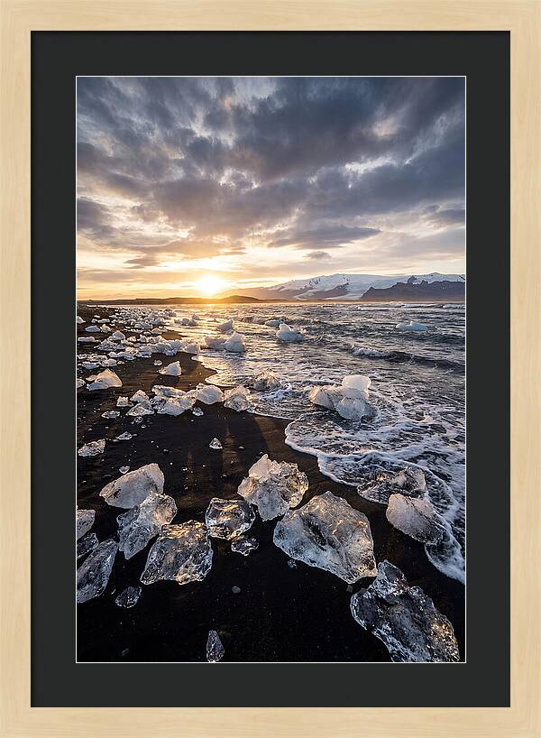 Icebergs At Sunset On Black Sand