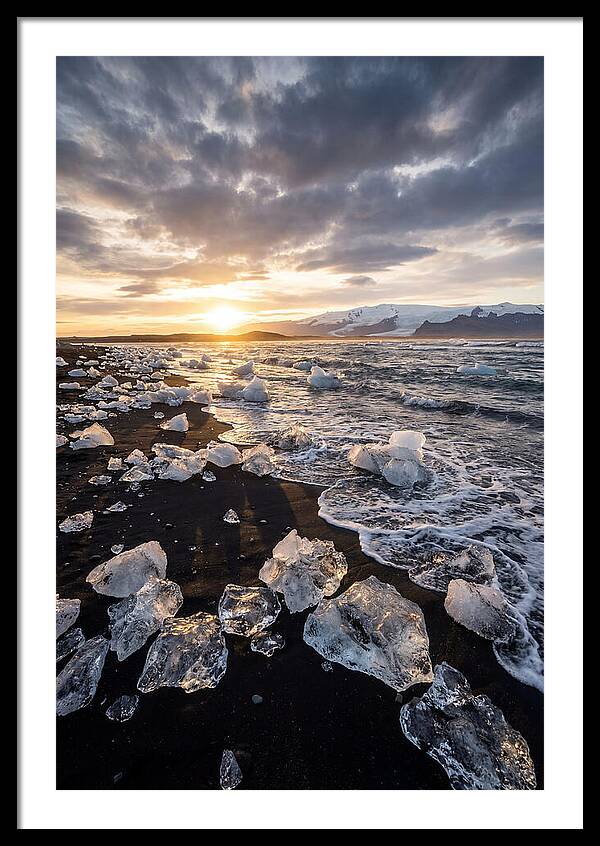 Icebergs At Sunset On Black Sand