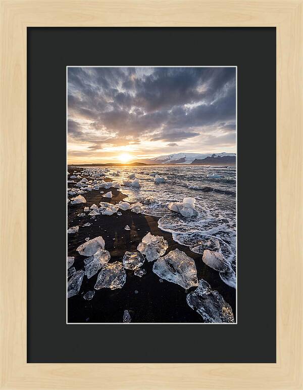 Icebergs At Sunset On Black Sand