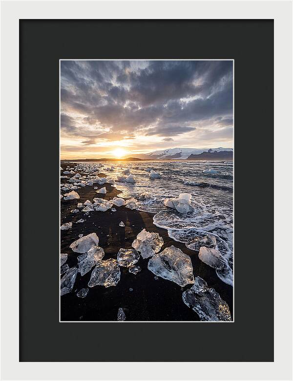 Icebergs At Sunset On Black Sand