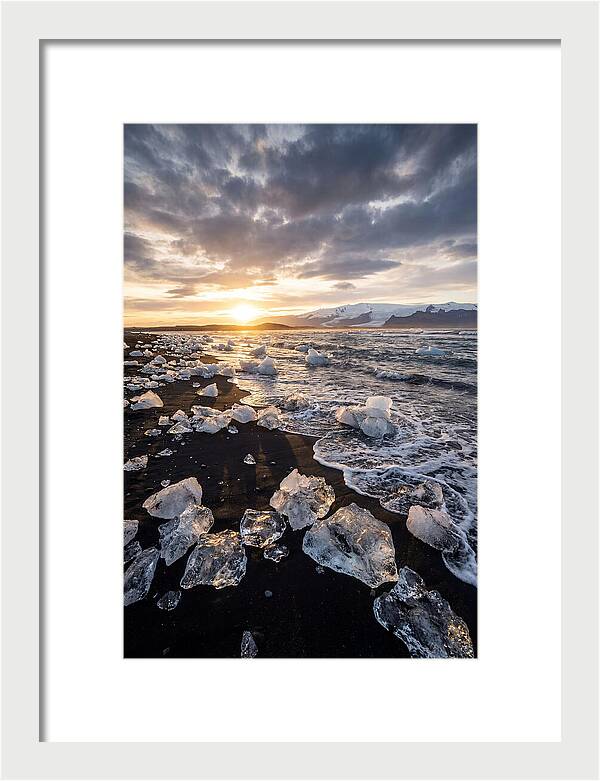 Icebergs At Sunset On Black Sand