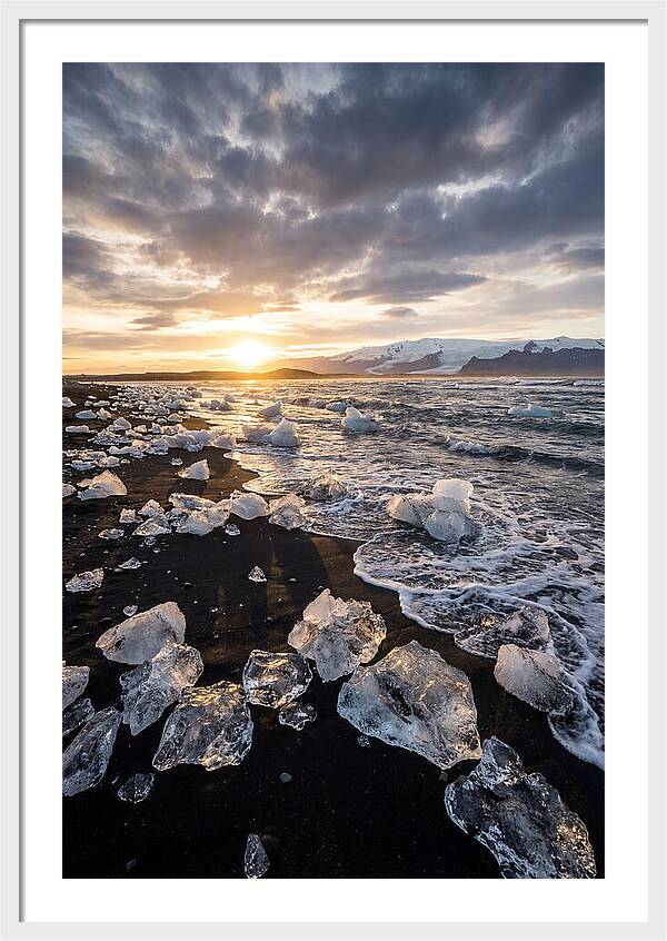 Icebergs At Sunset On Black Sand