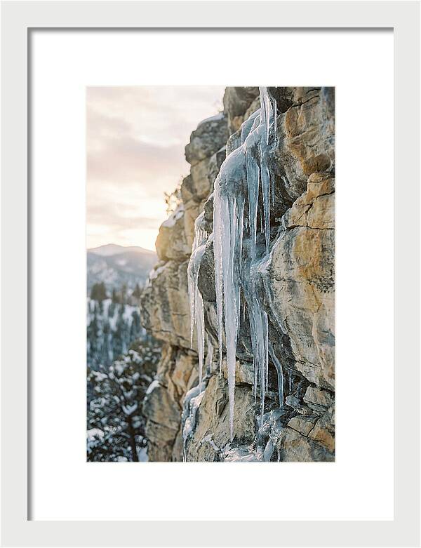 Icicles Hanging From Rocky Cliff