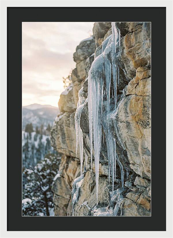 Icicles Hanging From Rocky Cliff