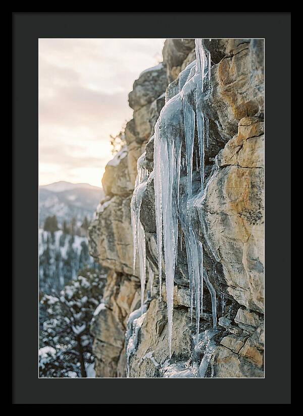 Icicles Hanging From Rocky Cliff