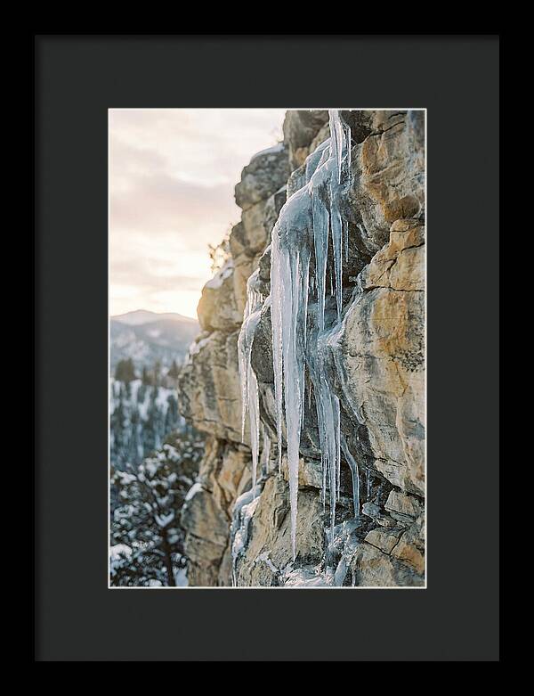 Icicles Hanging From Rocky Cliff
