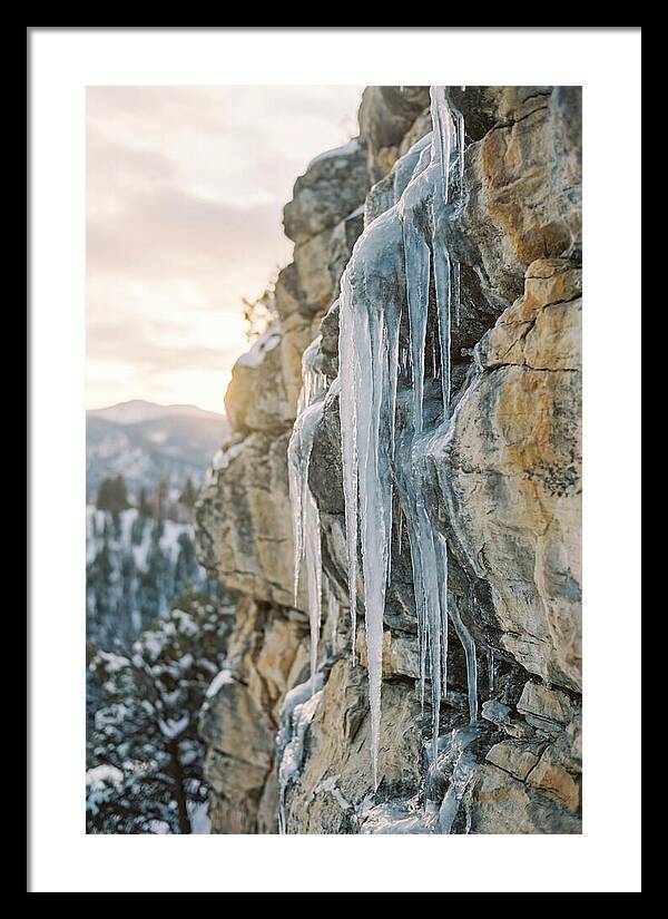 Icicles Hanging From Rocky Cliff