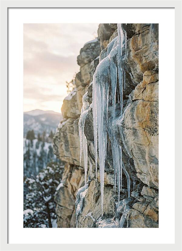 Icicles Hanging From Rocky Cliff