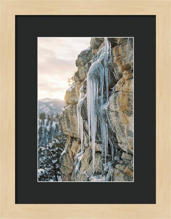 Icicles Hanging From Rocky Cliff