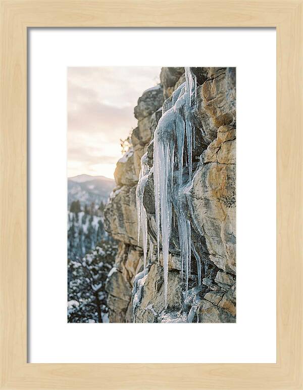 Icicles Hanging From Rocky Cliff