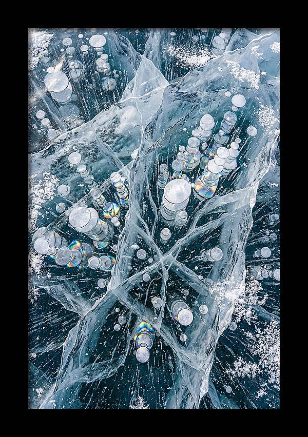 Icy Orbs Encased In Frost