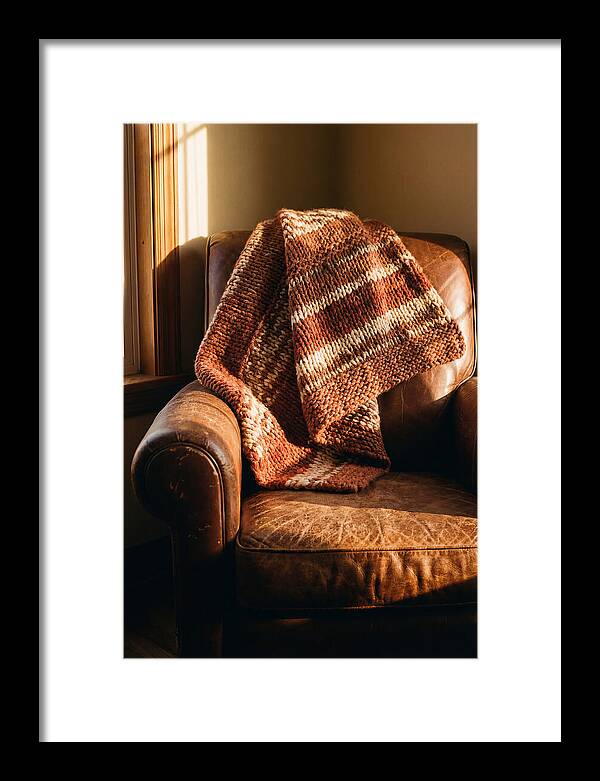 Knitted Blanket Over Leather Chair