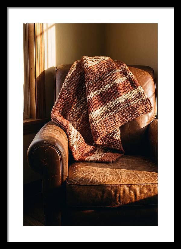 Knitted Blanket Over Leather Chair