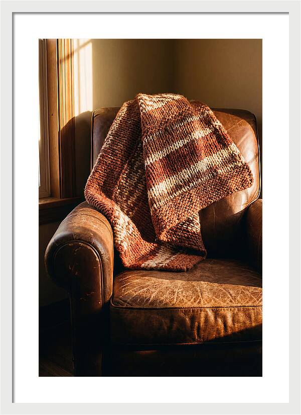 Knitted Blanket Over Leather Chair