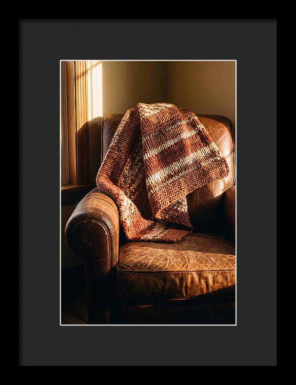 Knitted Blanket Over Leather Chair