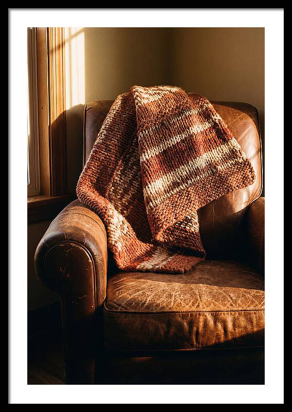 Knitted Blanket Over Leather Chair