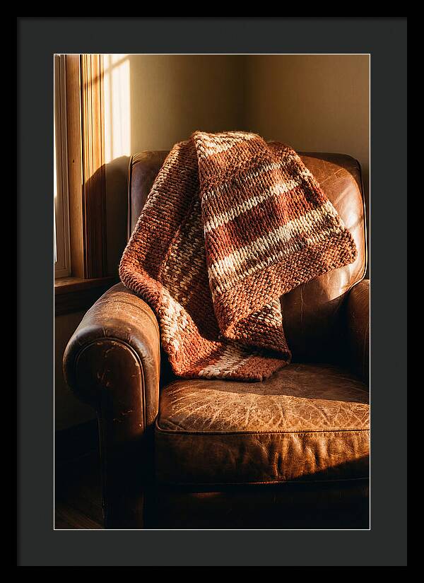 Knitted Blanket Over Leather Chair