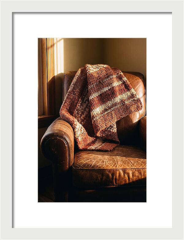 Knitted Blanket Over Leather Chair