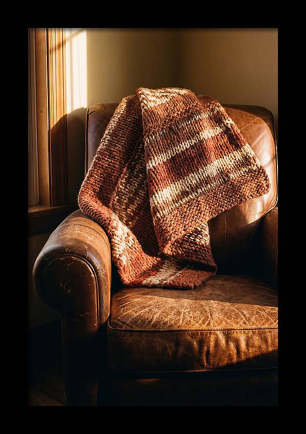 Knitted Blanket Over Leather Chair