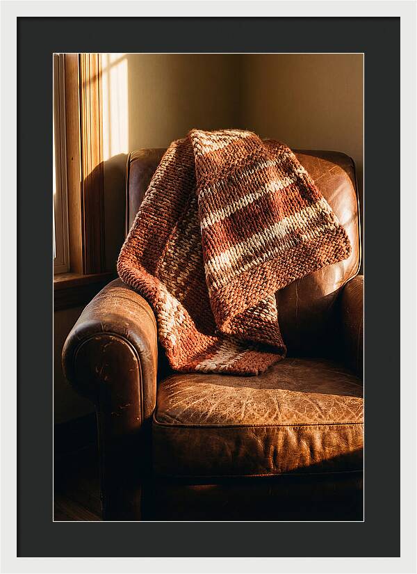 Knitted Blanket Over Leather Chair