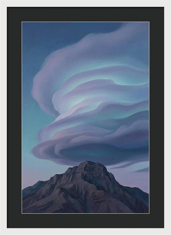 Lenticular Clouds Above Majestic Peaks