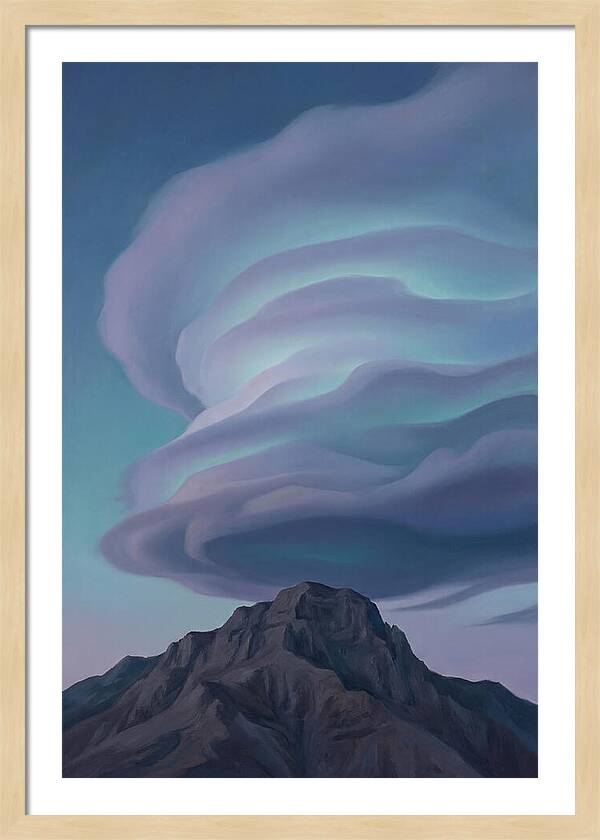 Lenticular Clouds Above Majestic Peaks