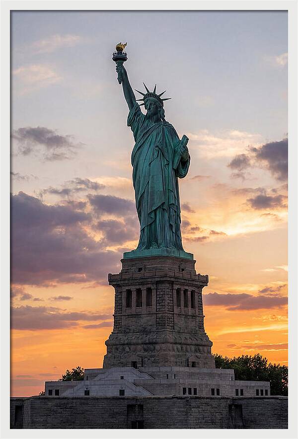 Libertys Glow At Dusk