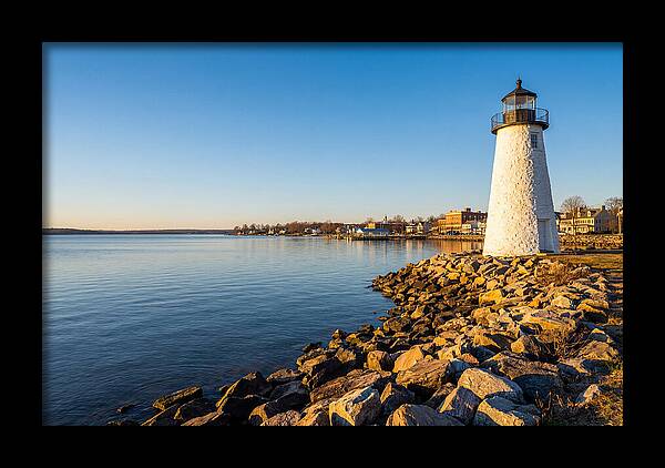 Lighthouse Reflections At Dawn