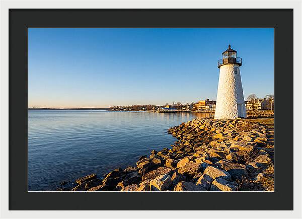 Lighthouse Reflections At Dawn