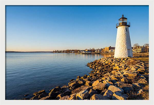 Lighthouse Reflections At Dawn