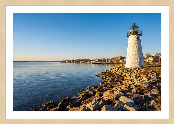 Lighthouse Reflections At Dawn