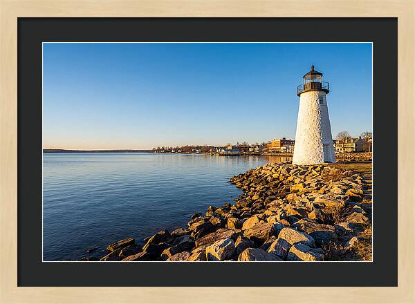 Lighthouse Reflections At Dawn