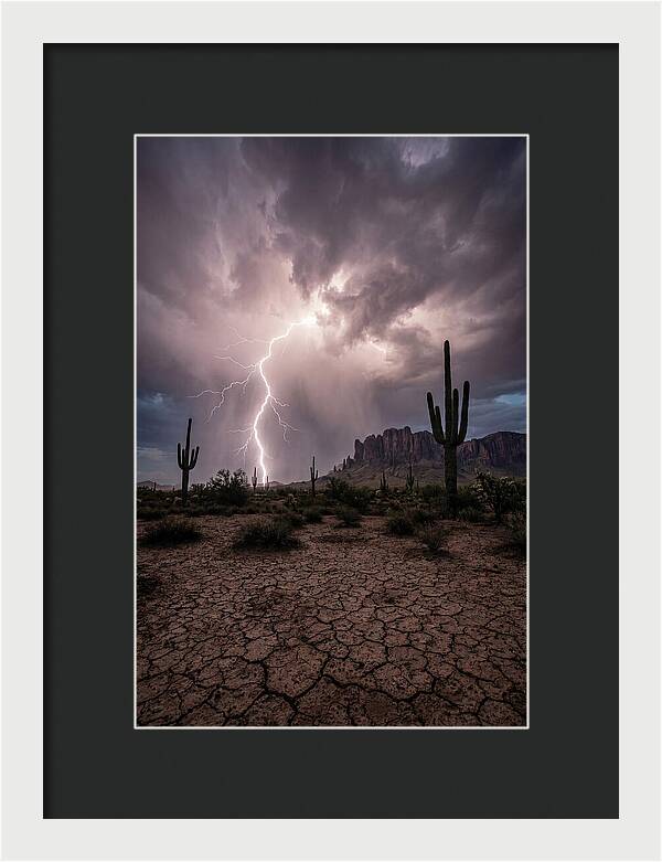 Lightning Strikes Over Desert Landscape