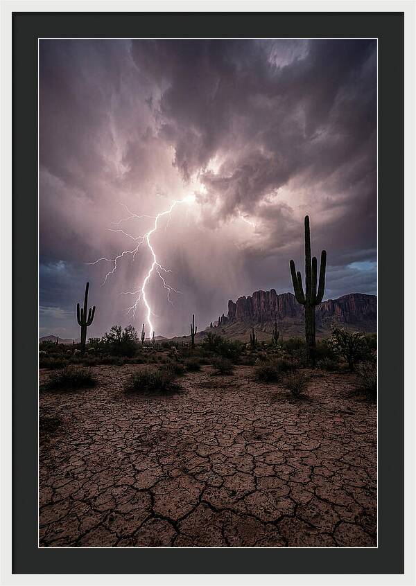 Lightning Strikes Over Desert Landscape