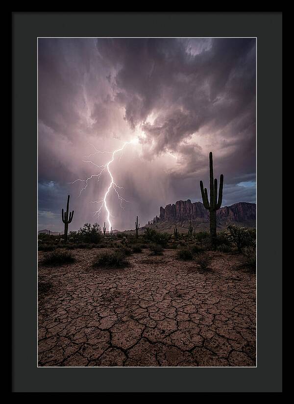 Lightning Strikes Over Desert Landscape