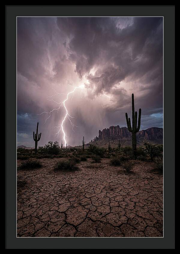 Lightning Strikes Over Desert Landscape