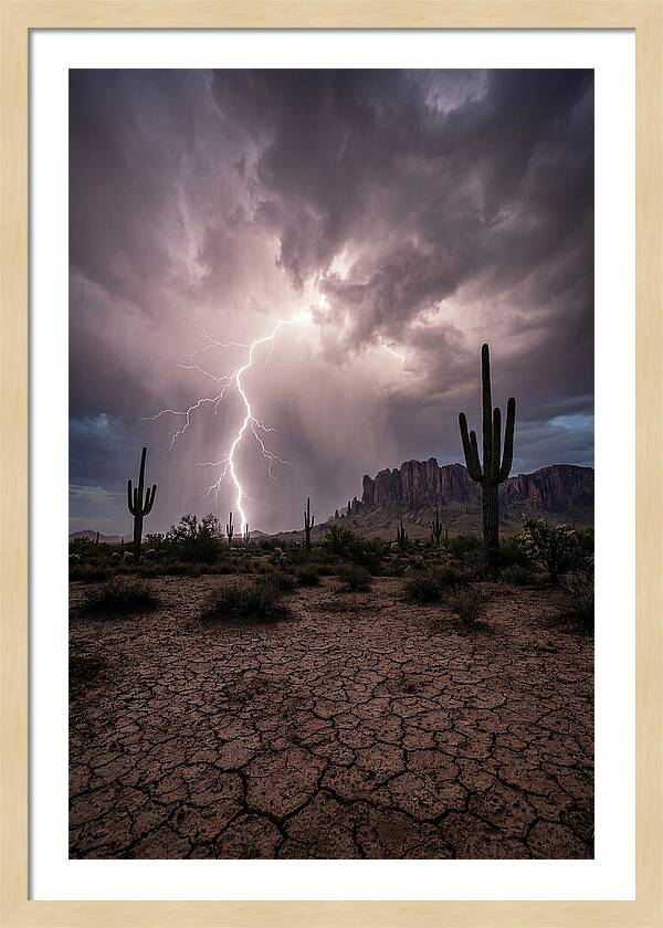 Lightning Strikes Over Desert Landscape