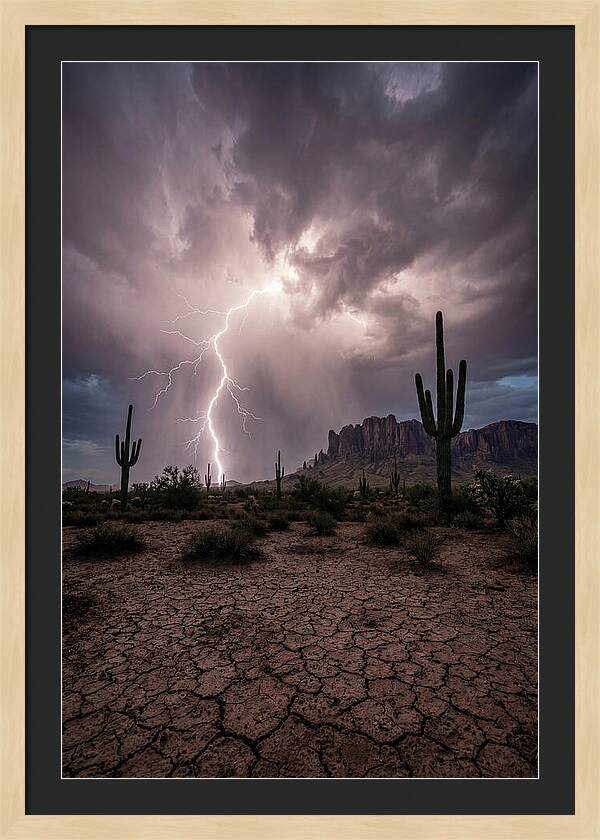 Lightning Strikes Over Desert Landscape
