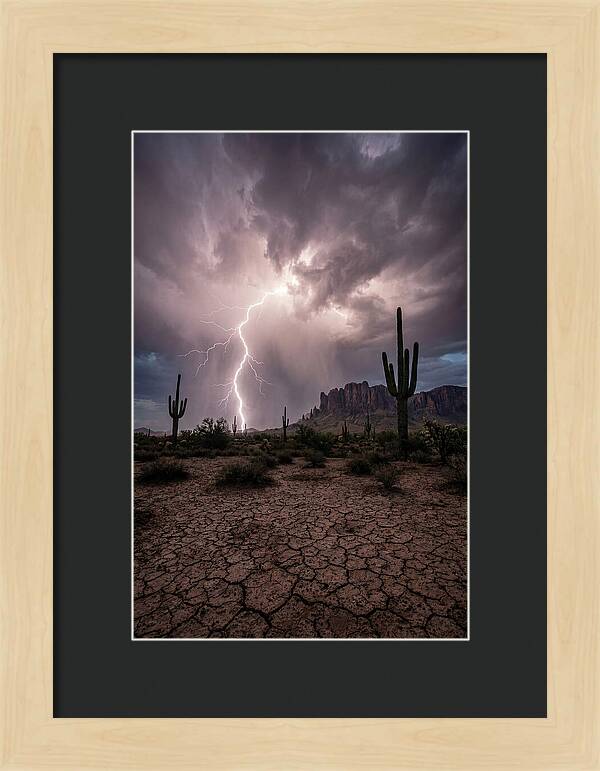 Lightning Strikes Over Desert Landscape