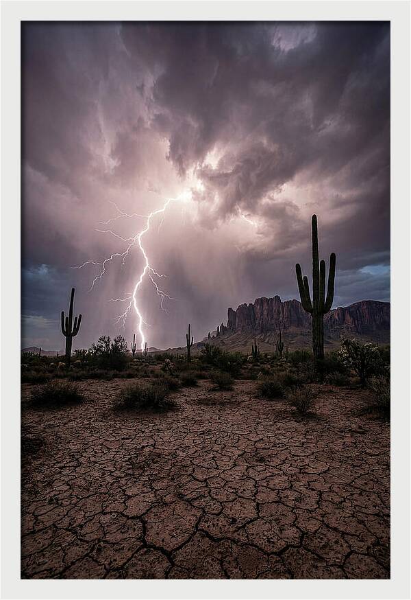 Lightning Strikes Over Desert Landscape