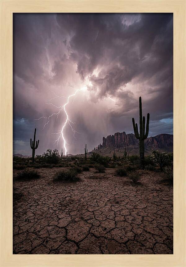 Lightning Strikes Over Desert Landscape