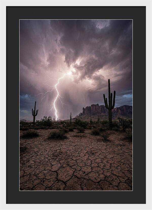 Lightning Strikes Over Desert Landscape