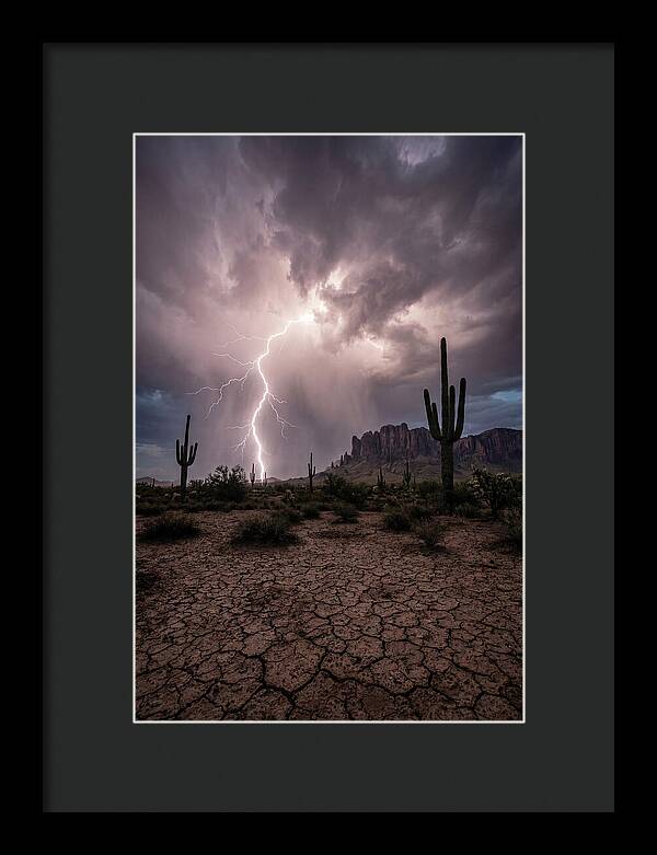 Lightning Strikes Over Desert Landscape